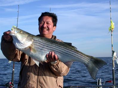 Mike with the big fish of the day at 38 inches